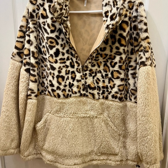 entro Jackets & Blazers - Super soft & furry brand new without tags 3/4 zip pullover with pouch pocket